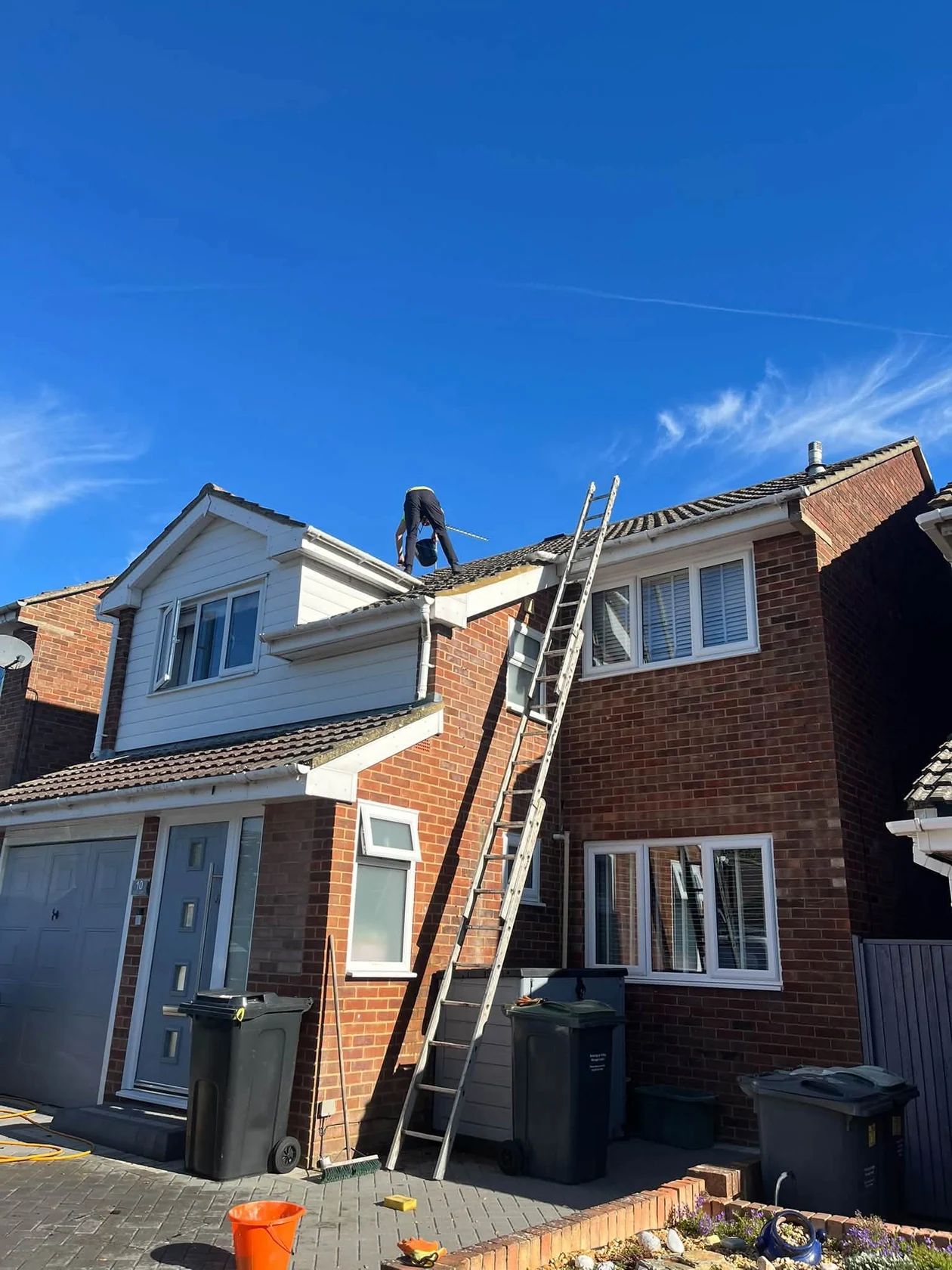 Roofer attending a repair at a local residential property